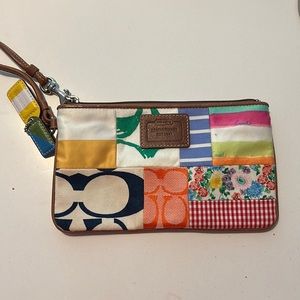Patchwork coach wristlet - like new condition